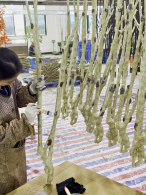 Artificial plant trunk coating